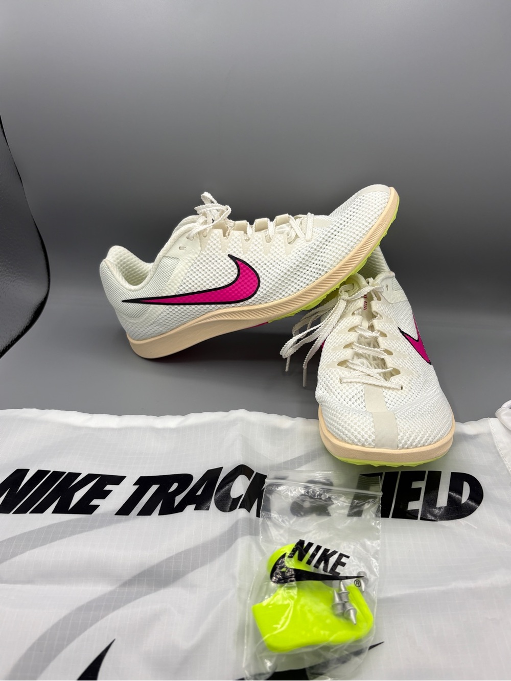 Nike Cream/White Track Spikes with Pink Swoosh
